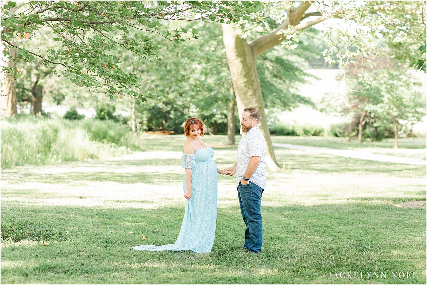 Inspiration for a summer maternity session at St. Louis Forest Park Grand Basin by Jackelynn Noel Photography